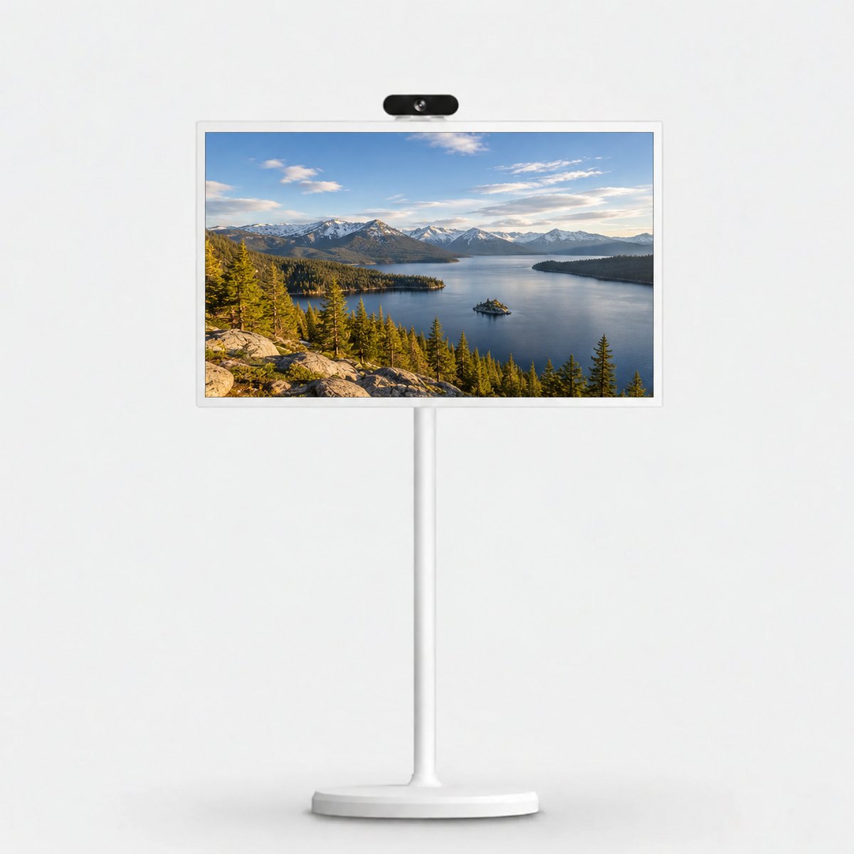 TV HOME in front of a mountain lake at sunset